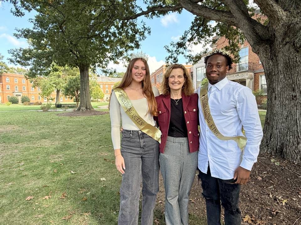 Homecoming Queen Ashley Chmielewski, President Dr. Shonna Riedlinger, Homecoming King Donell Jackson Jr.