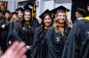 ODU graduates enter the Alumni Hall Gymnasium during the Academic Processional for Commencement on December 6, 2024.