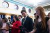 Graduates look at their programs.